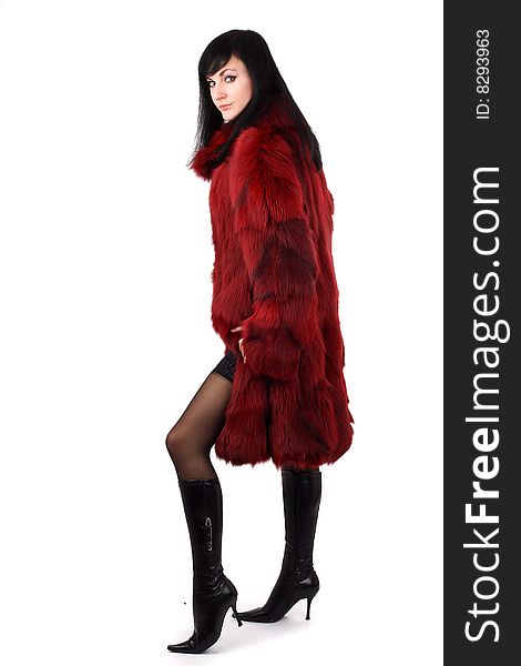 Brunette is in a red fur coat