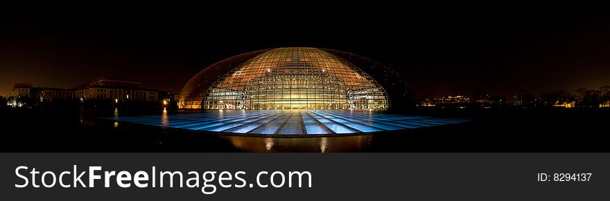 The panorama of the China National Theater in Peking at night.