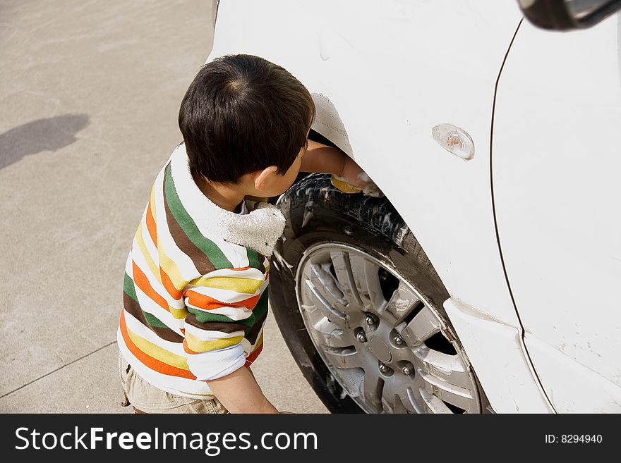 Boy Washing Car