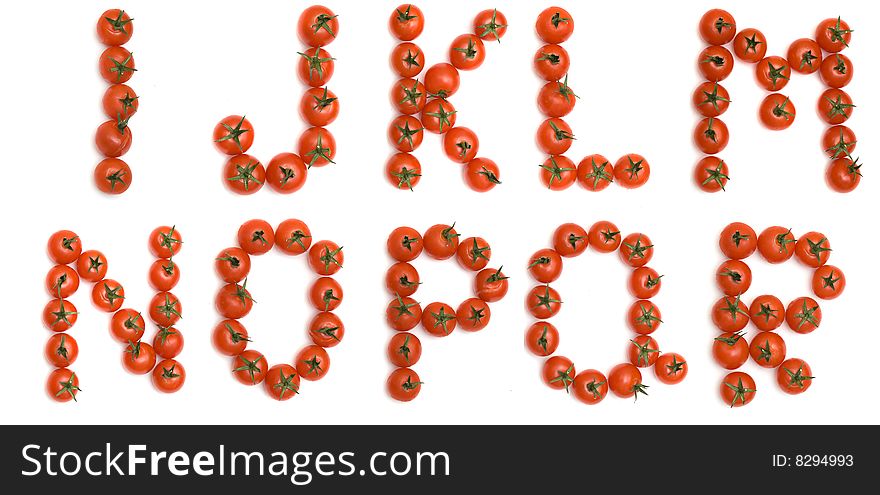 Letters of English alphabet formed from tomatoes