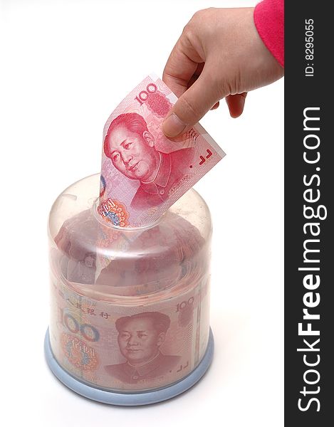 A hand is taking one hundred chinese bill from tissue box, isolated. A hand is taking one hundred chinese bill from tissue box, isolated.