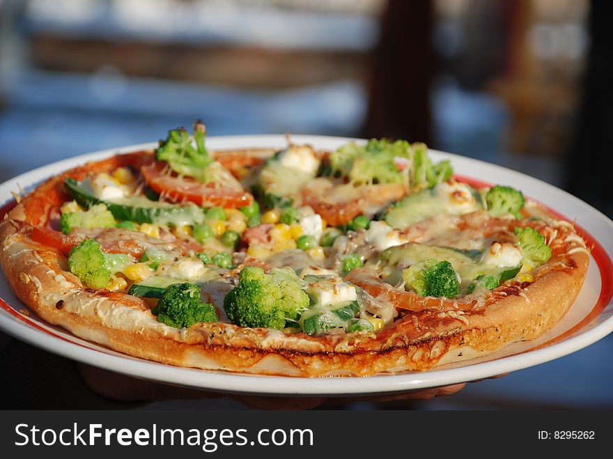 Traditional italian fresh pizza close-up