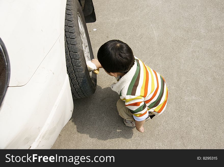 boy washing car