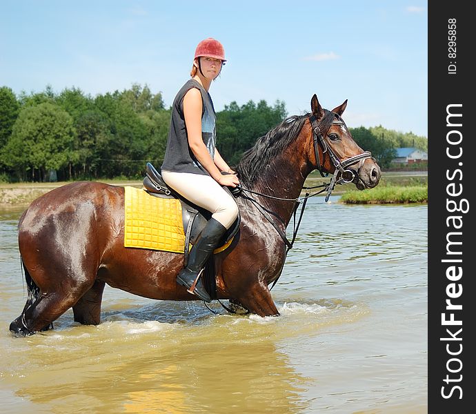 Horse-woman on horse outdoor