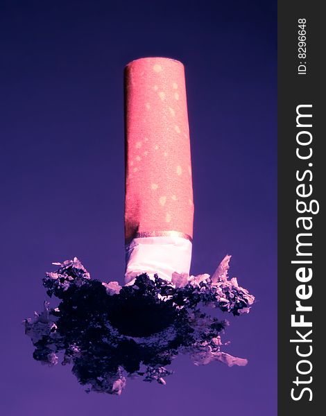 Cigarette stub in red and blue tones