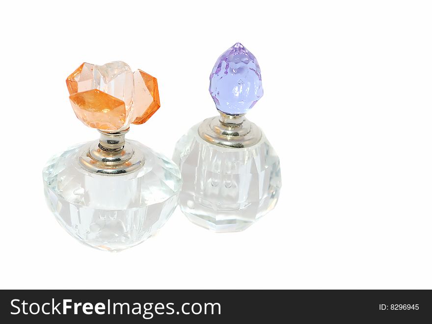 Two crystal luxury bottle isolated on the white background. Two crystal luxury bottle isolated on the white background.