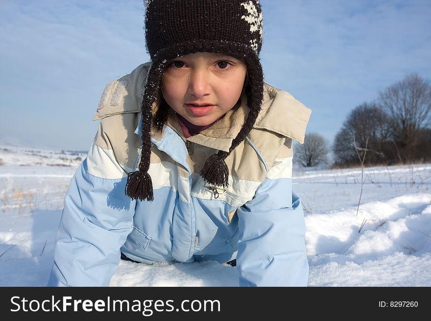 Portrait of Winter girl in snow