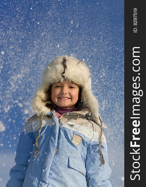 Cute Little Girl Surrounded By Snowflakes