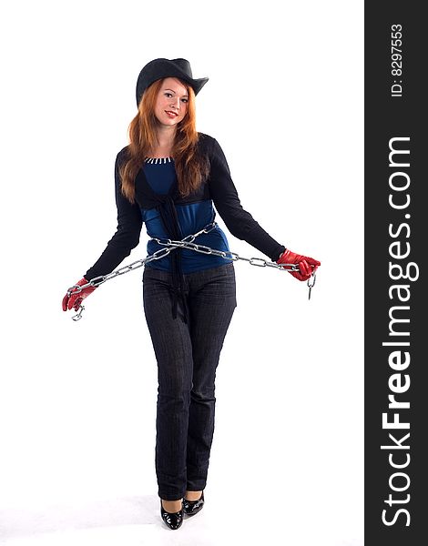 Young girl with red gloves, chain and black hat standing on white background. Young girl with red gloves, chain and black hat standing on white background