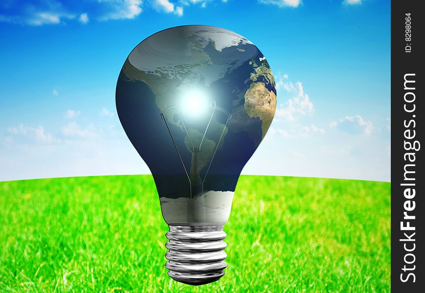 Light bulb with earth map at blue sky and green grass backgrouund