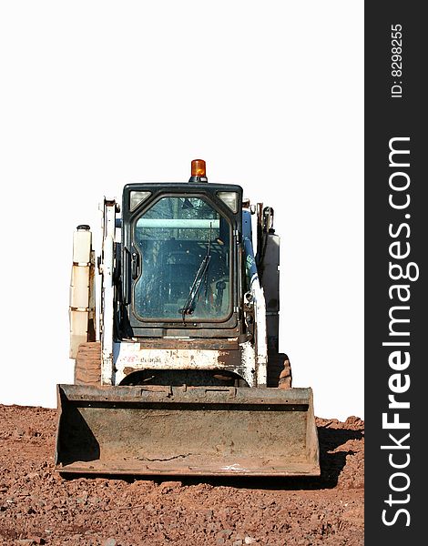 Isolated small buldozer with dirt. Isolated small buldozer with dirt