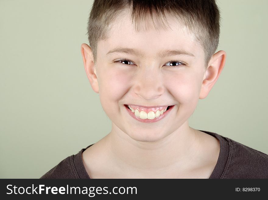 Portrait of smiling boy with big teeth