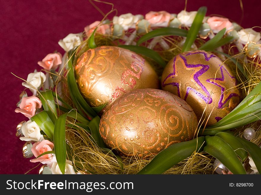 Easter Eggs Golden  And A Burning Candle