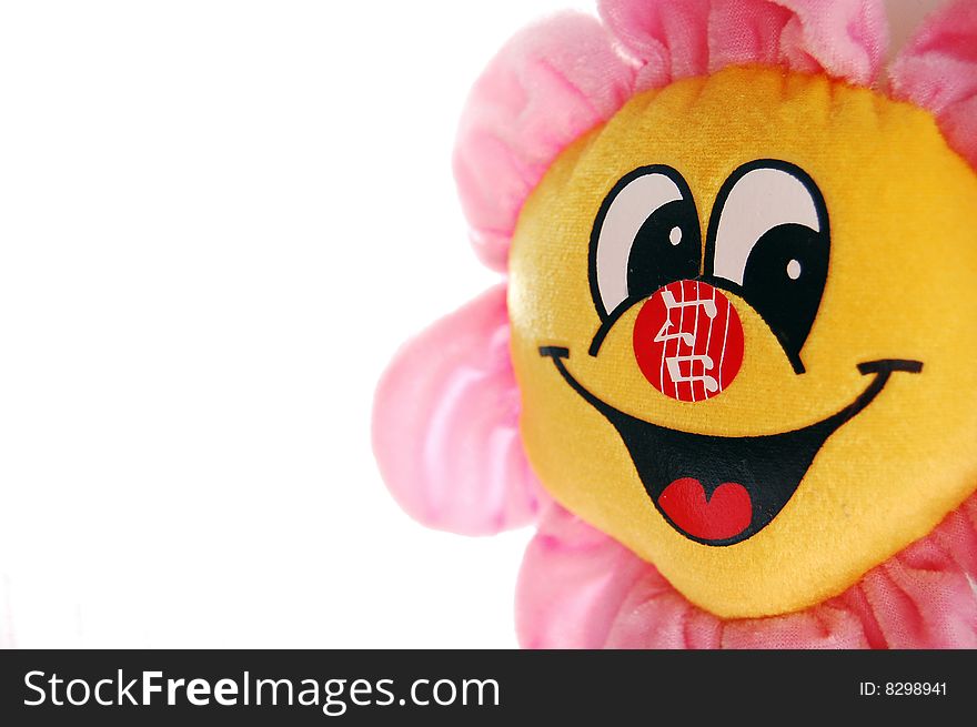 Flower mascot toy. For kids. Funny and smiling.