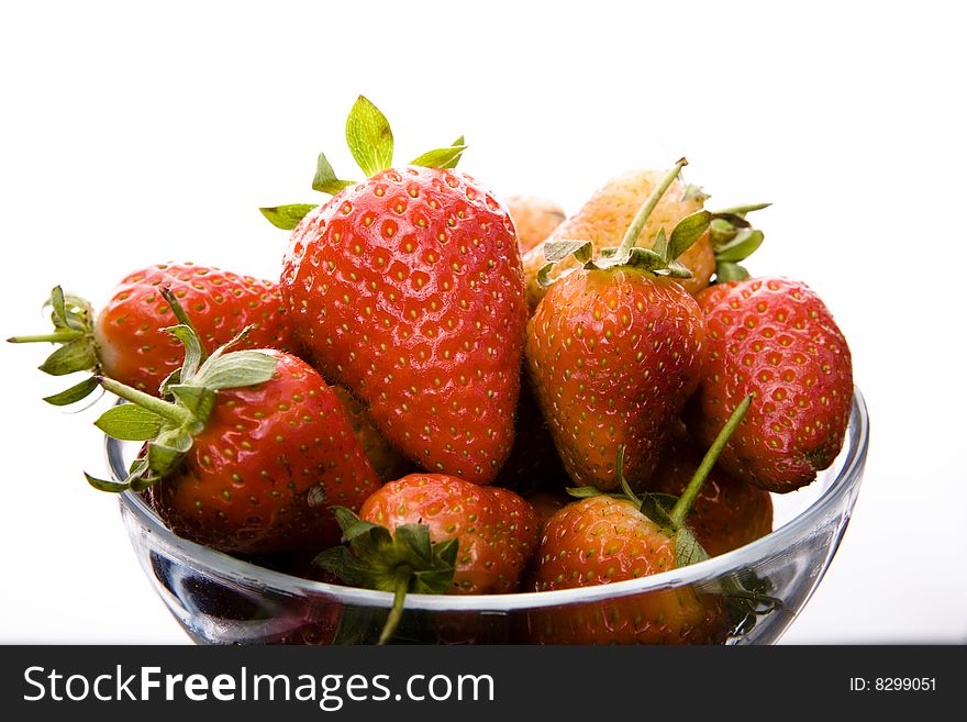 Strawberry in plate on white background