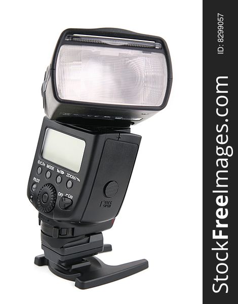 Modern flashlight on a support, isolated on a white background