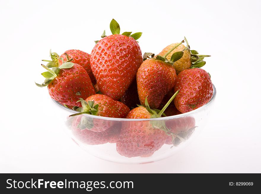 Strawberry in plate on white background