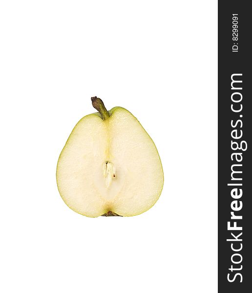 Pear cut in half towards white background