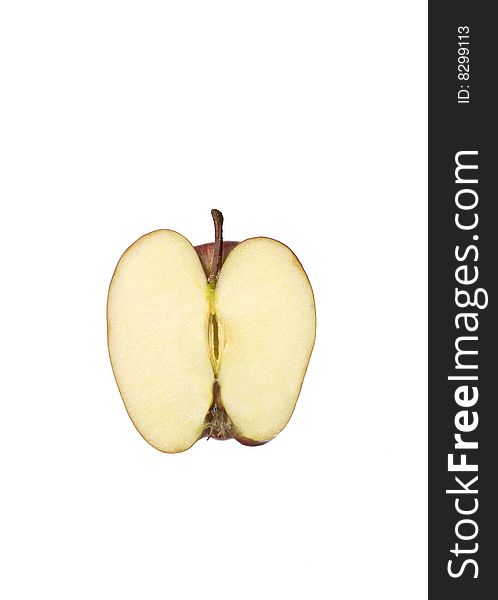 Apple cut in half towards white background. Apple cut in half towards white background
