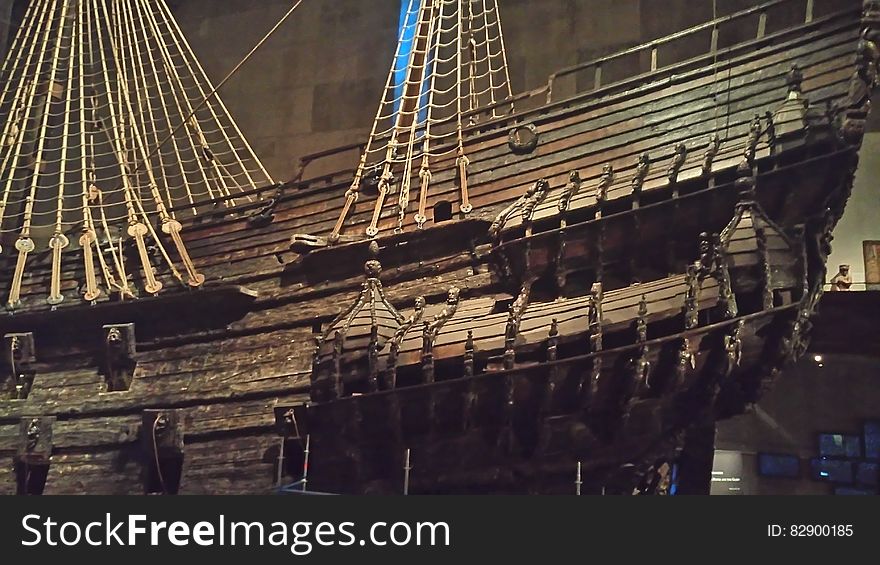 Hull and sides of wooden sailing ship inside museum. Hull and sides of wooden sailing ship inside museum.