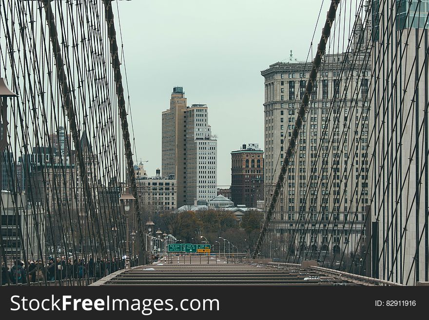 New York city skyline on Manhattan viewed from Brooklyn bridge, USA.