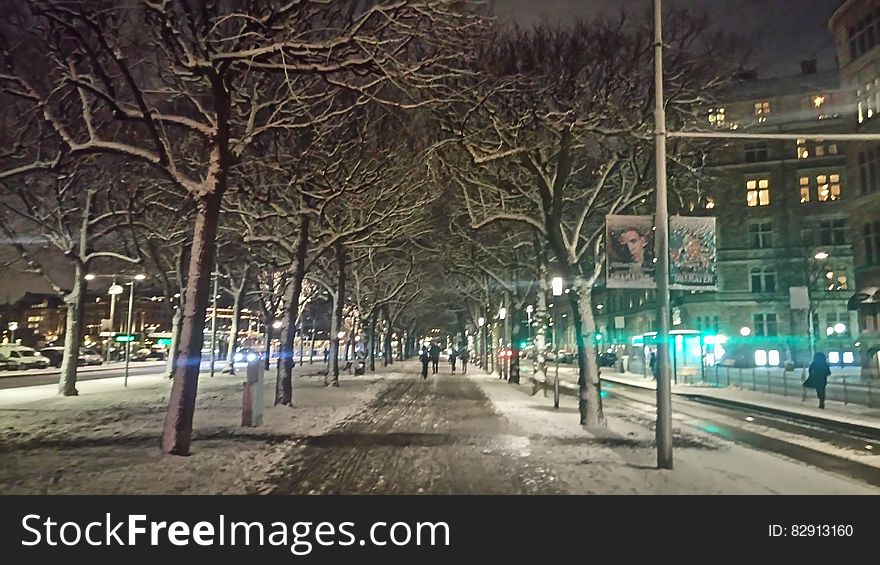 Snowy City Streets At Night