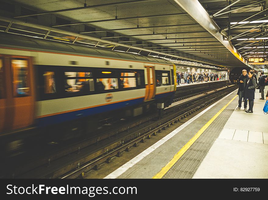 Train moving by platform