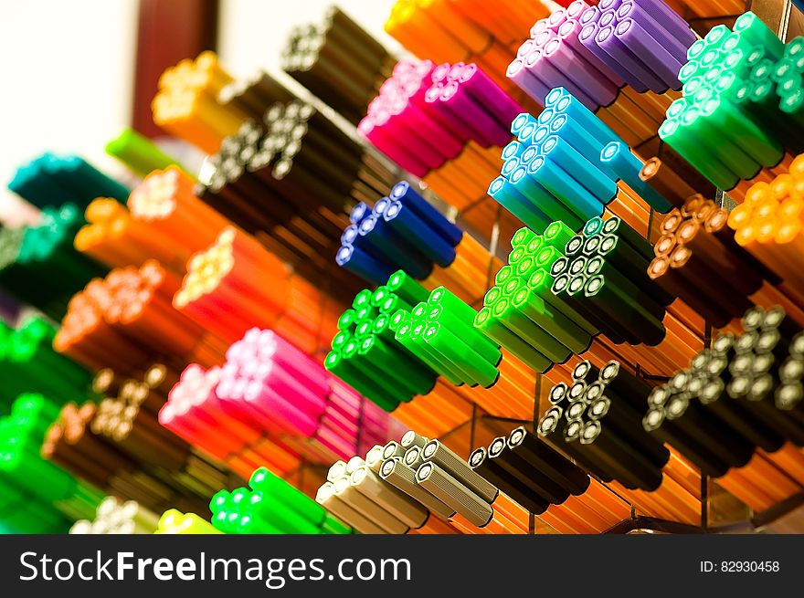 Focus Photography of Colored Pens