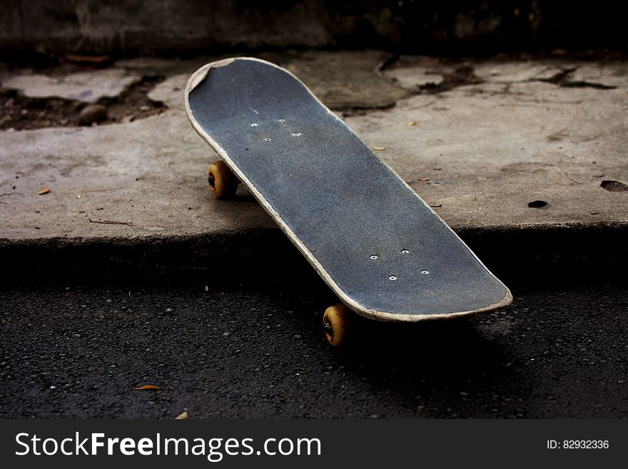 Gray and Black Skateboard