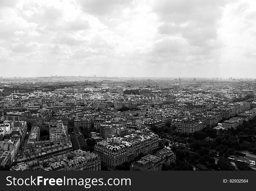 A black and white image of Paris, view over the rooftops of the city. A black and white image of Paris, view over the rooftops of the city.