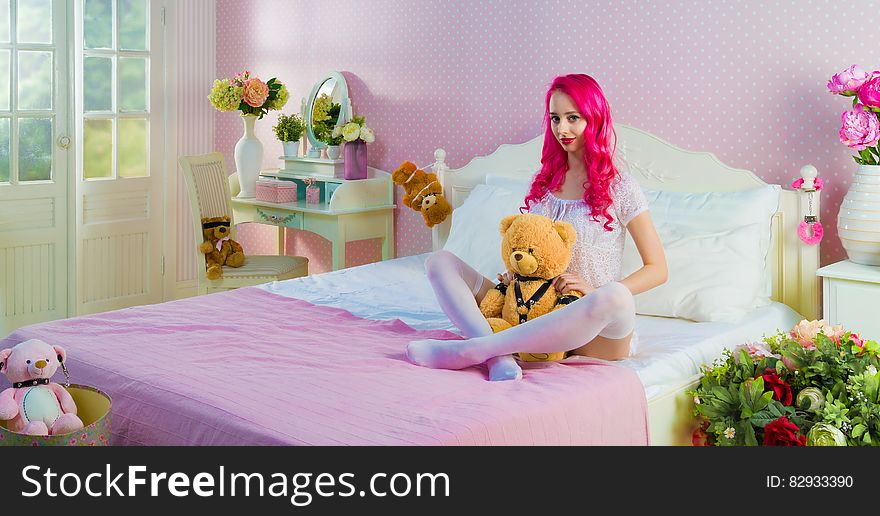 Woman Hugging Beige Bear Plush Toy