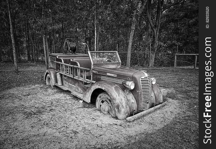 Gray Scale Photo of Vintage Car