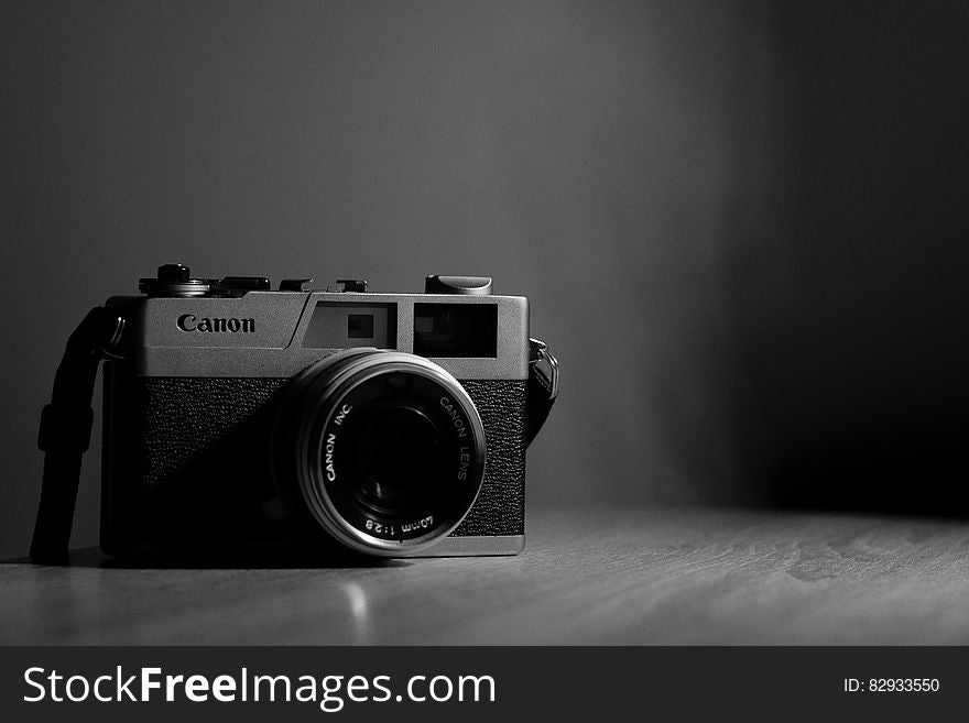 Vintage Canon camera in black and white.
