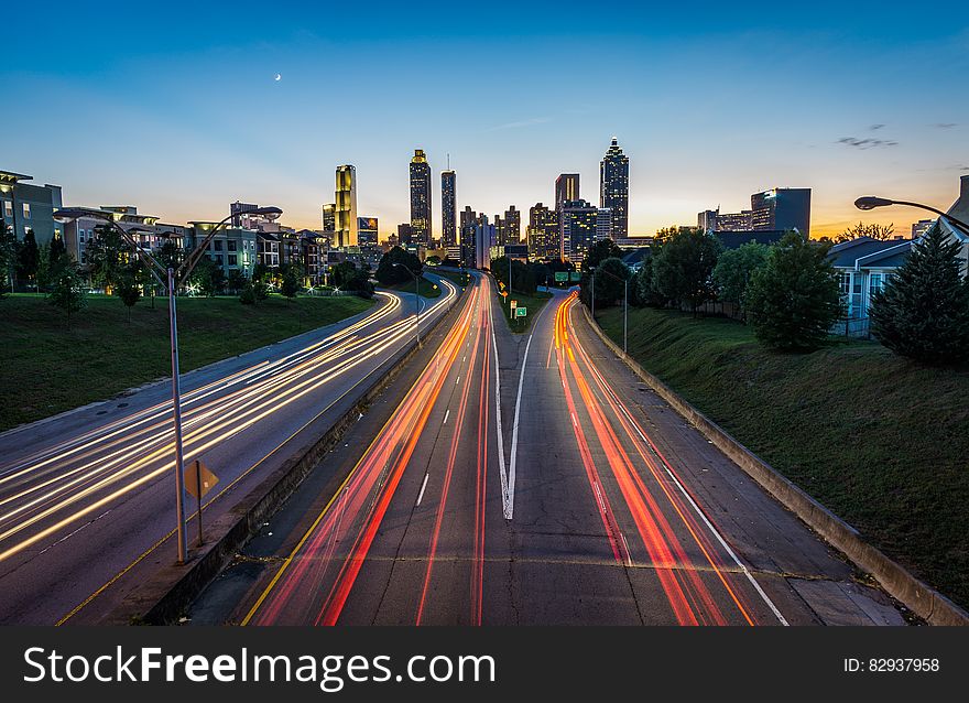 Time Lapse Photography of Road Near Town