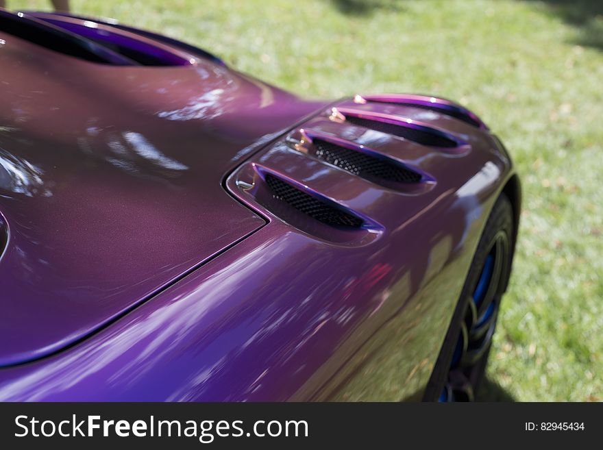 Purple Sport Car during Daytime