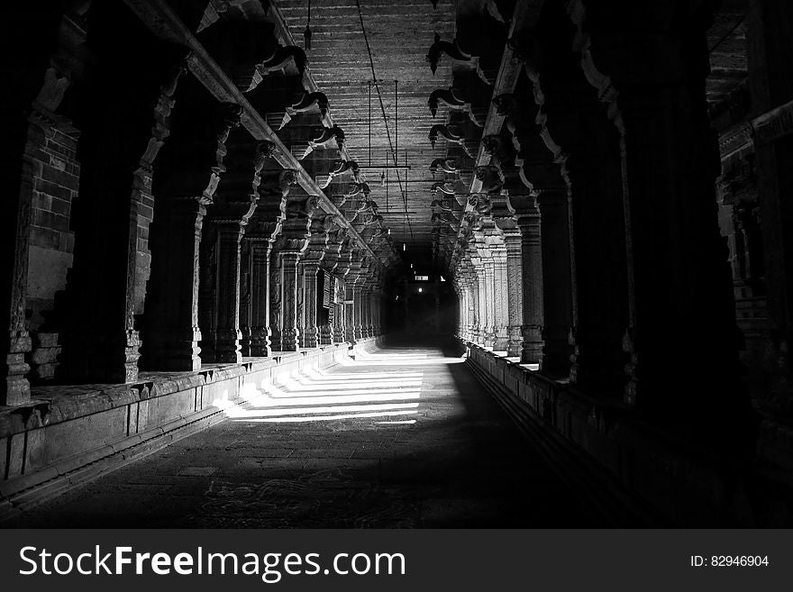 Grayscale Photo of Hallway