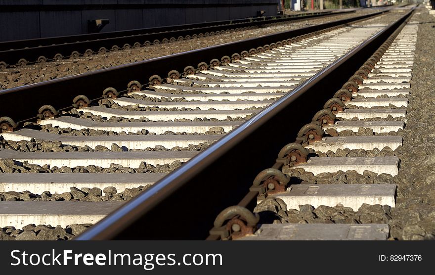 Black and Gray Metal Train Rail