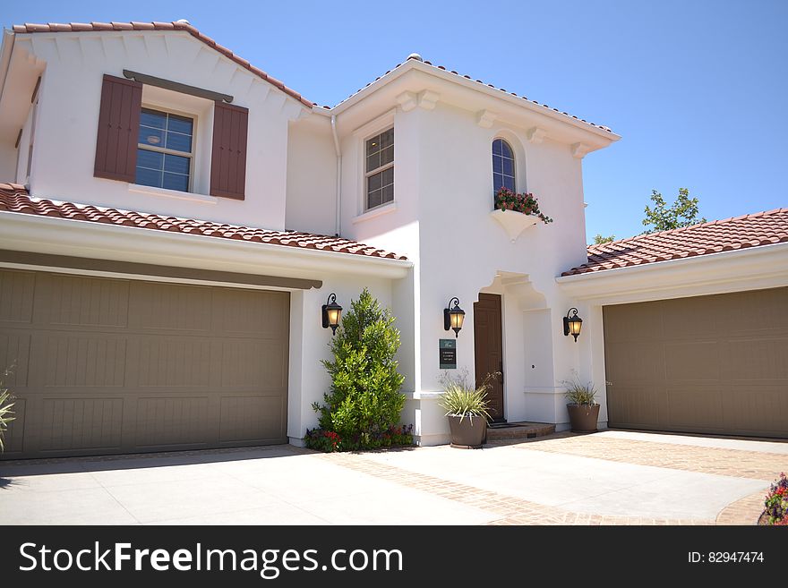 White Concrete 2-storey House