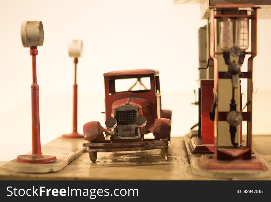 Antique car and gas station toys.