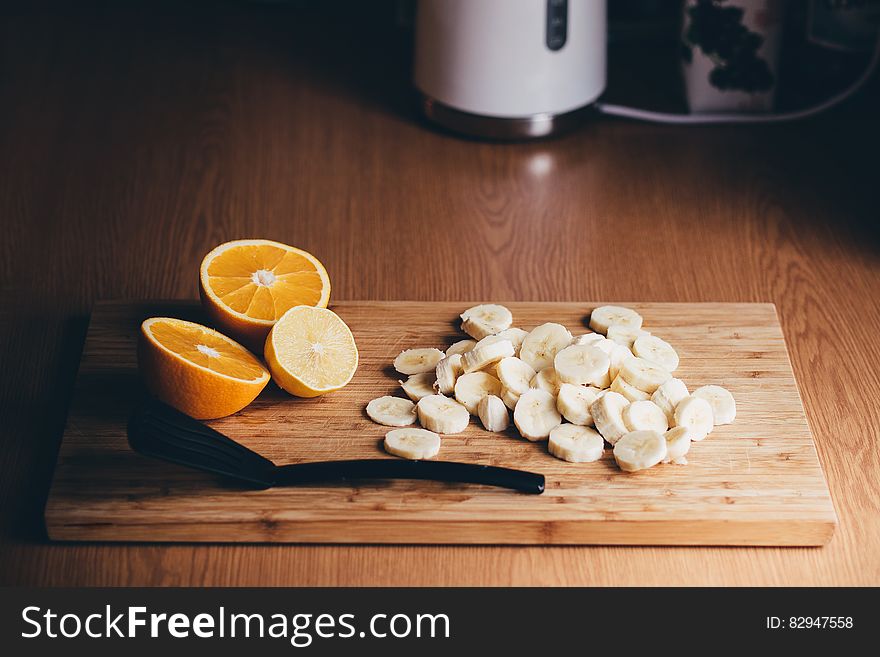 Sliced bananas and oranges