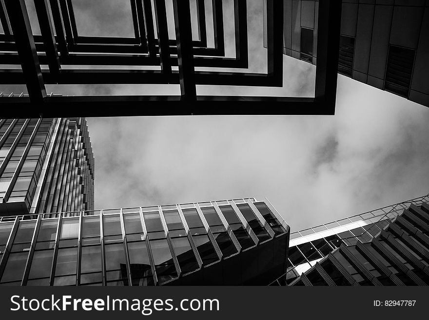 A black and white photo of architectural details in a modern city. A black and white photo of architectural details in a modern city.