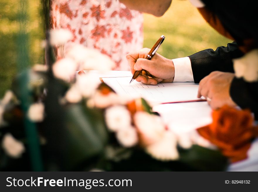 Person Drawing On White Paper