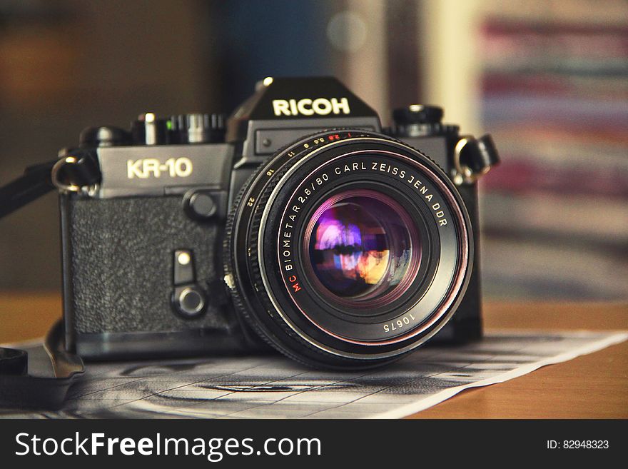 Vintage Ricoh KR-10 camera on tabletop. Vintage Ricoh KR-10 camera on tabletop.