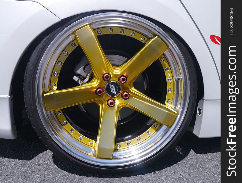Yellow 5 Spoke Car Wheel