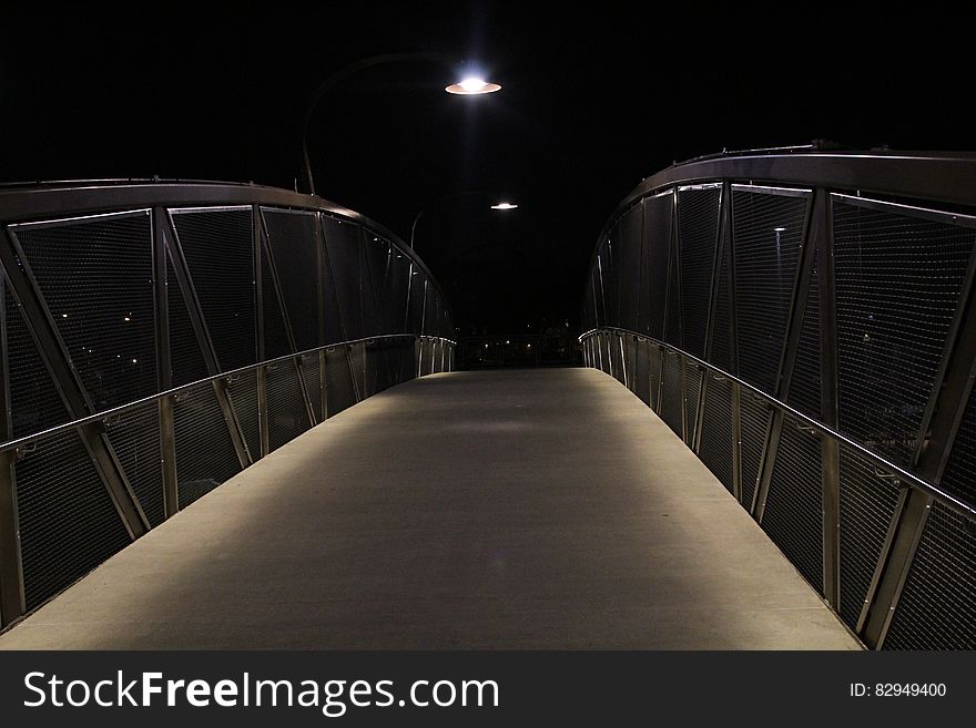Gray Beige Bridge during Night Time