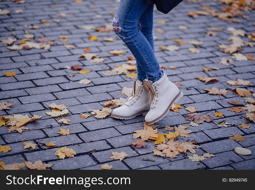 Person Wearing White Work Boots