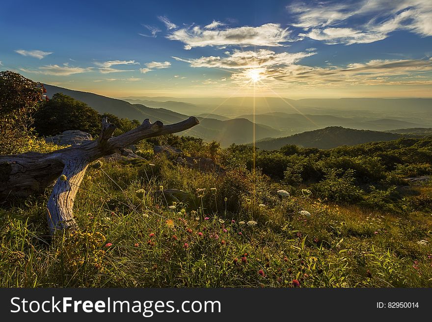 Mountain View during Sun Rise Under Blue Sky Photo