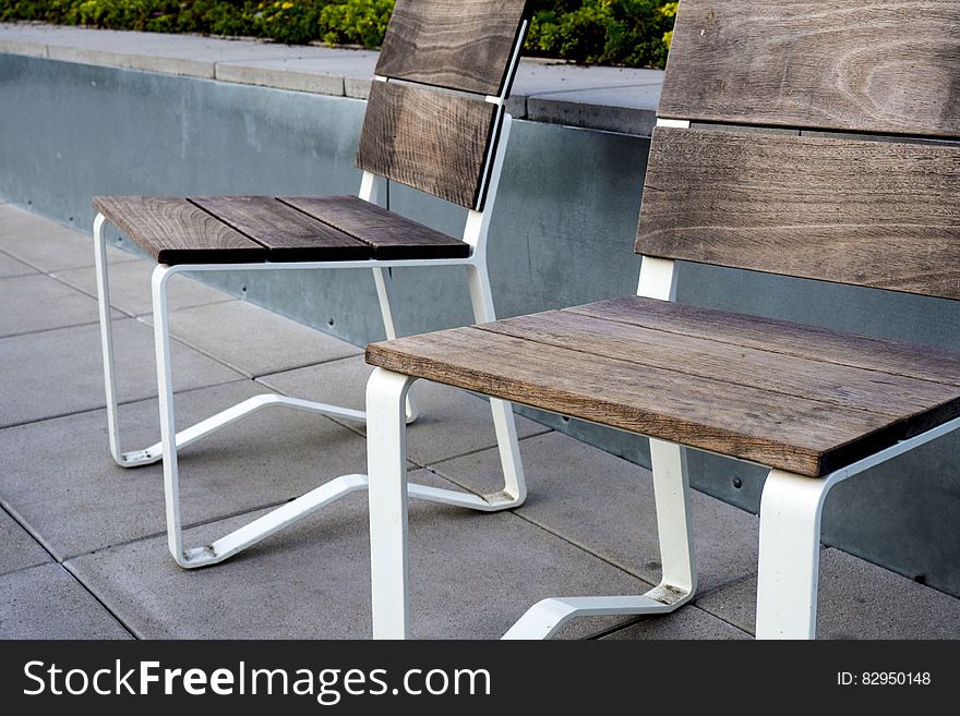 2 Wooden Chair on Top Tile Outdoor