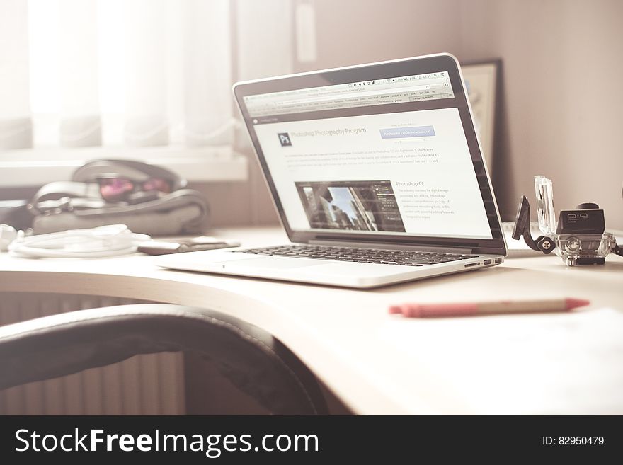 Black and Gray Laptop Computer on Writing Desk