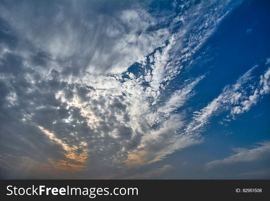 Fluffy clouds on a sunny day.